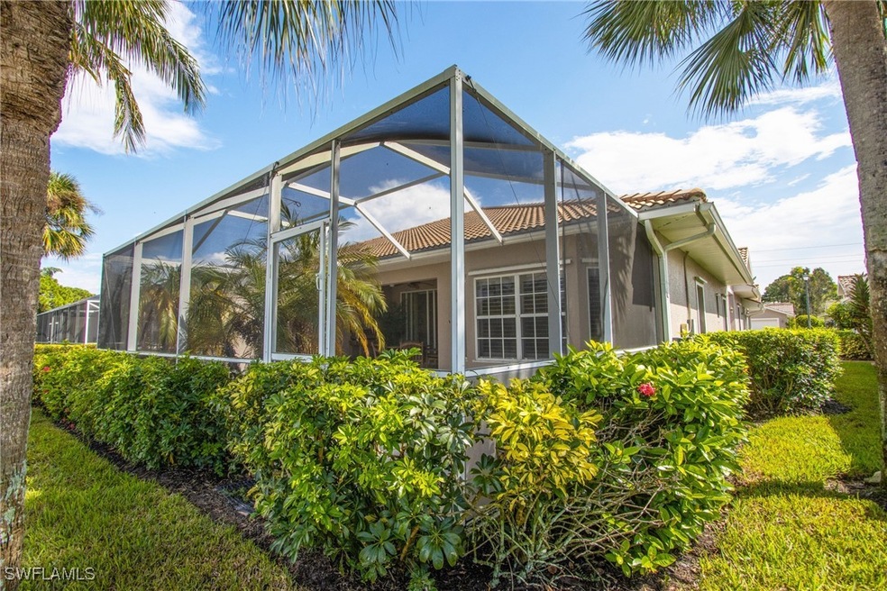 Rear view of property with glass enclosure