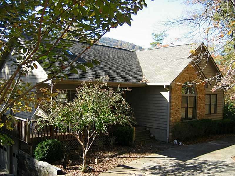 Exterior Front. Stone accents and concrete siding 