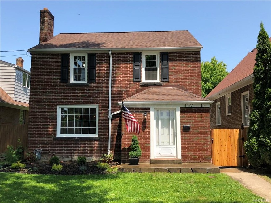 This all brick Colonial has tons of charm and feat