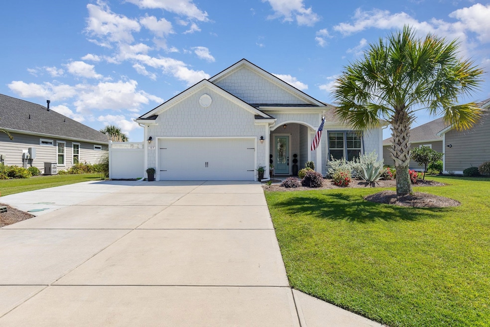 View of front of property featuring cooling unit, 