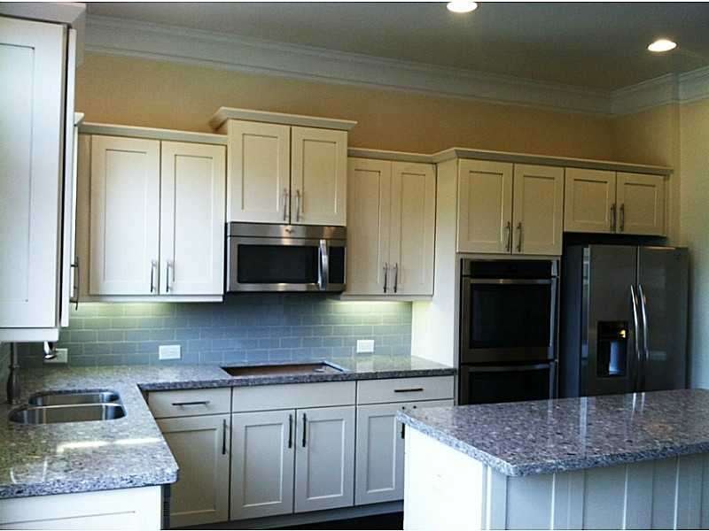 Kitchen. Chef s kitchen complete with double ovens