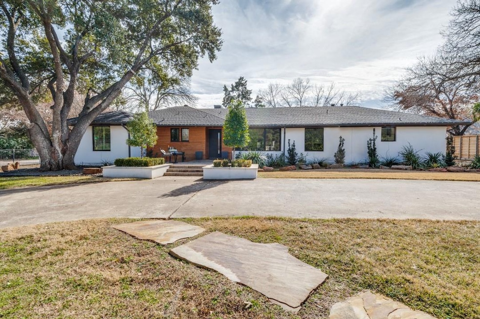 Ranch-style home with a front yard