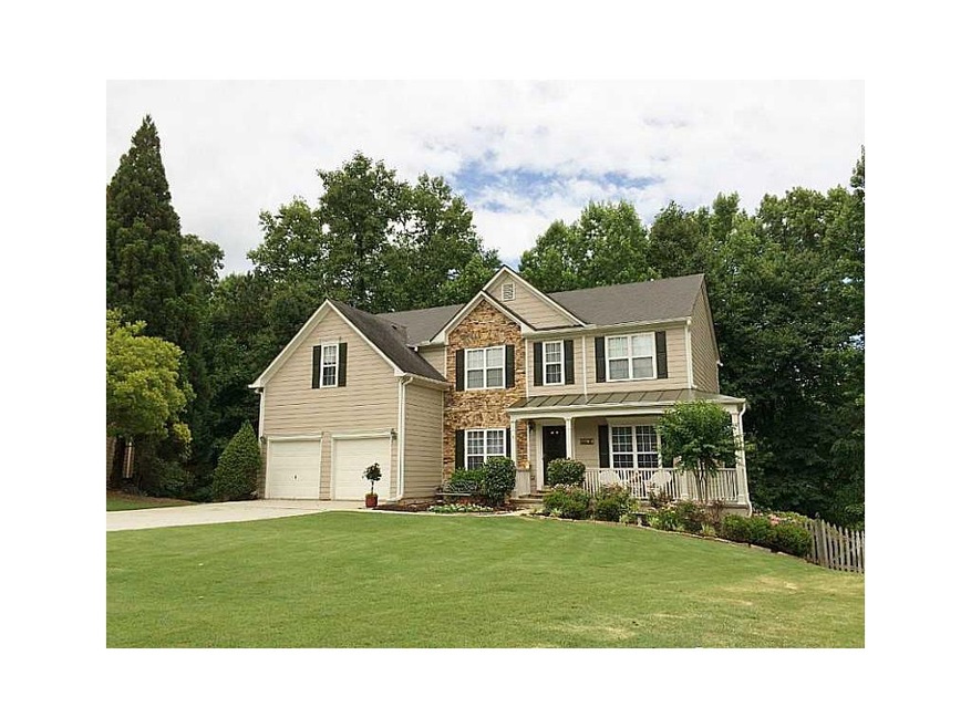 Exterior Front. Large traditional home on a cul de