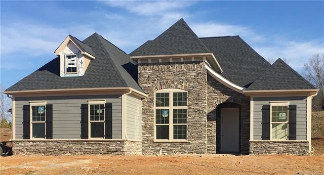 Beautiful stone + James hardie exterior ranch home