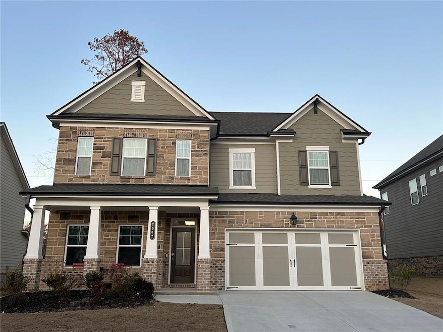 Craftsman-style house featuring a garage