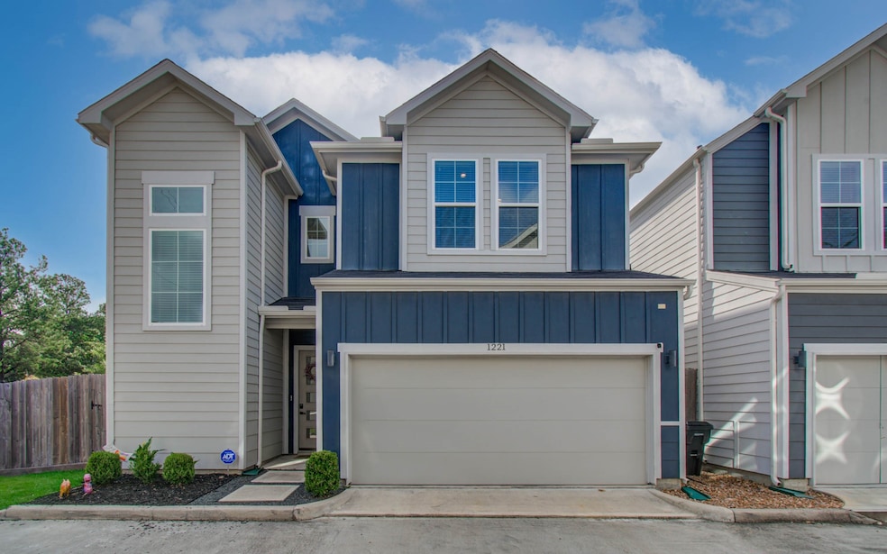 This is a modern two-story home with a clean facad