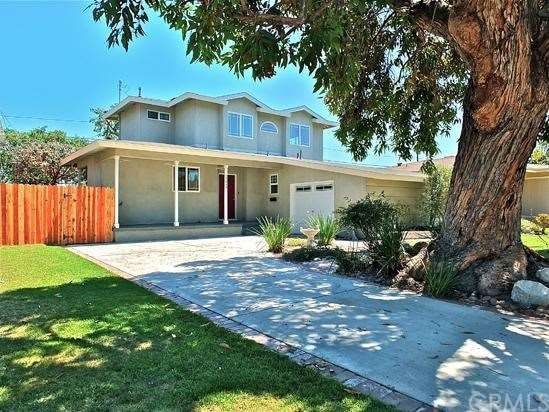 LOVELY 4 BEDROOM 3 BATH HOME IN THE PLAZA! ALMOST 