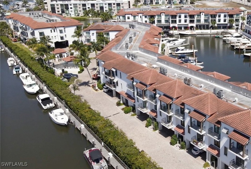 Aerial view of a large body of water and apartment