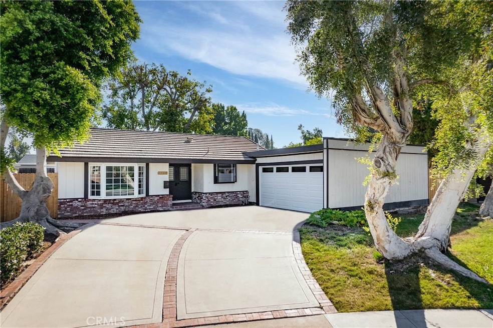 Exterior Front. Stain from driveway was removed from this image.