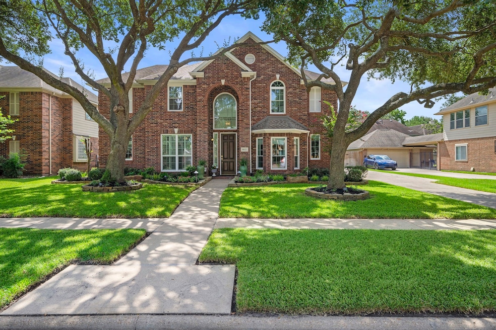 8822 Apple Mill Dr, Houston, TX 77095 - photo 1