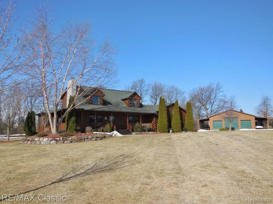 2447 N Hacker Rd 10 acre Log House paradise