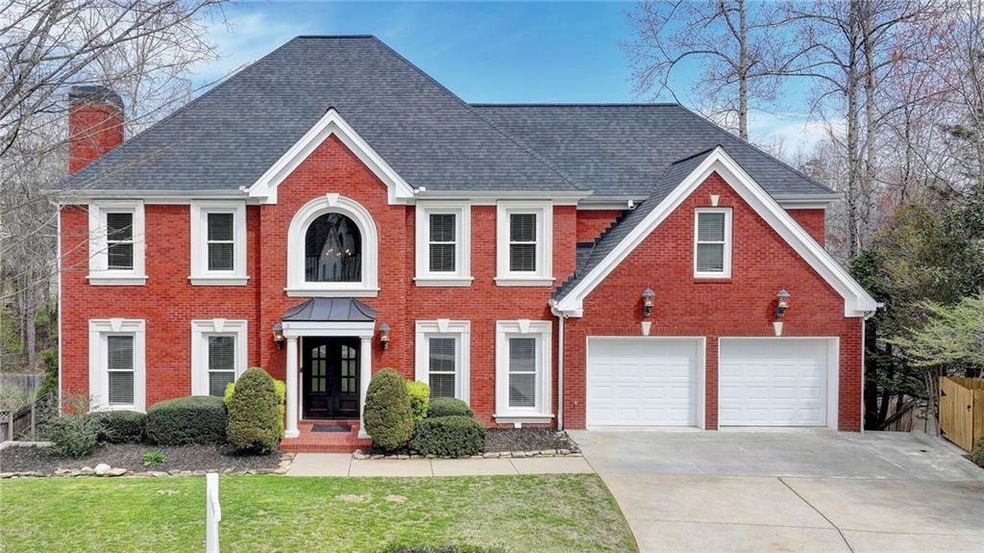 Welcome home to this four sided brick beauty!
