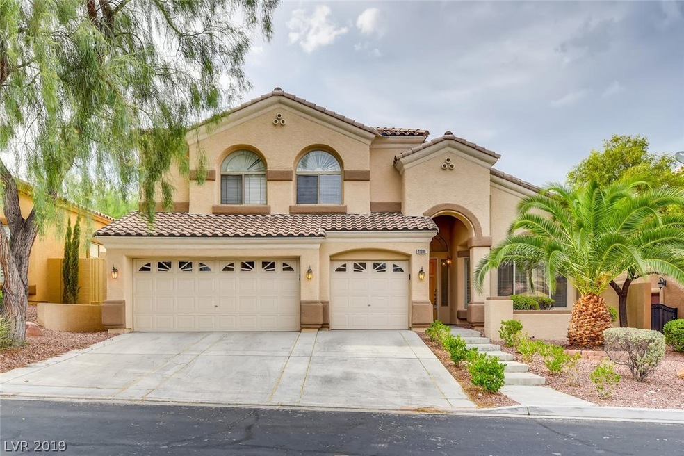 front view with 3 car garage