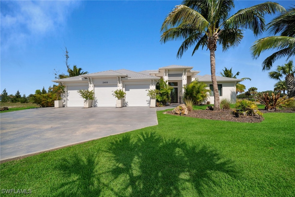 Prairie-style house featuring concrete driveway, s