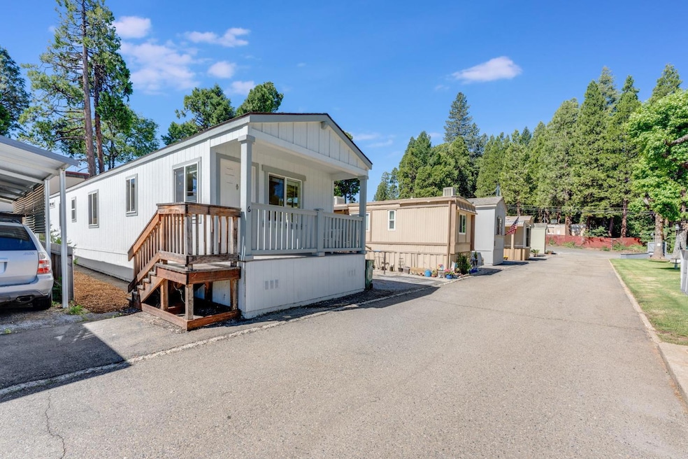 Front Of Home - Flat, Paved Road For Easy Access.