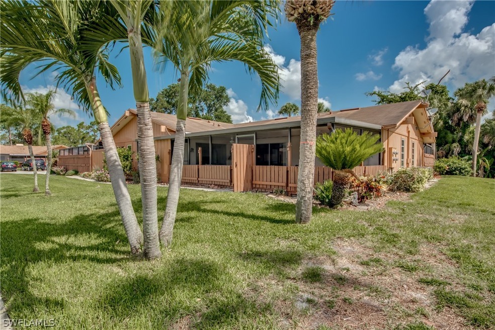 Front of home with fold down privacy fence