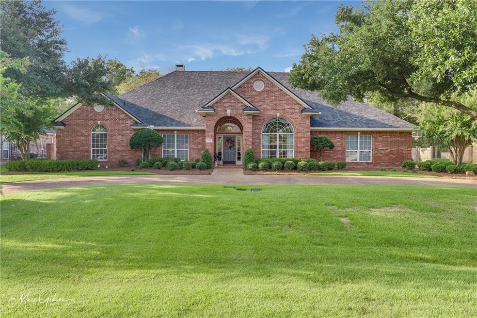 Fabulous home with circular drive.