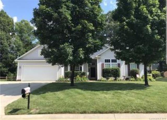 Beautiful ranch home with well manicured yard and 