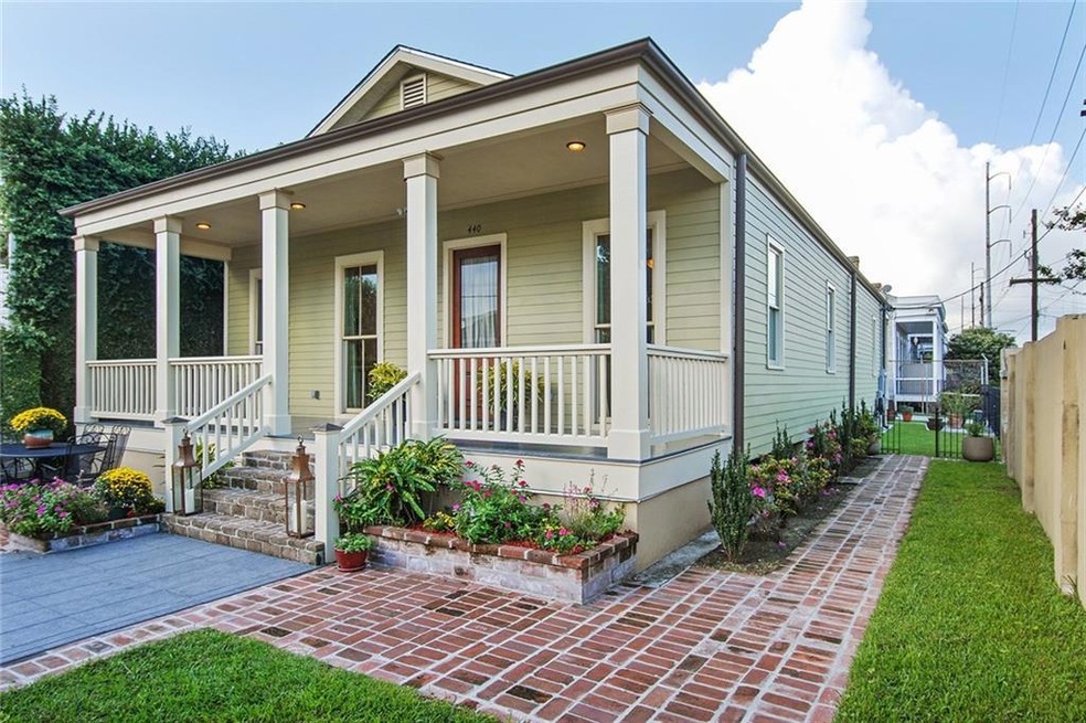 The secluded front exterior features a covered dee