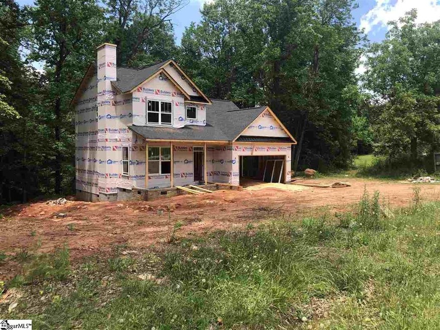 The house sits on the center of a full acre with s