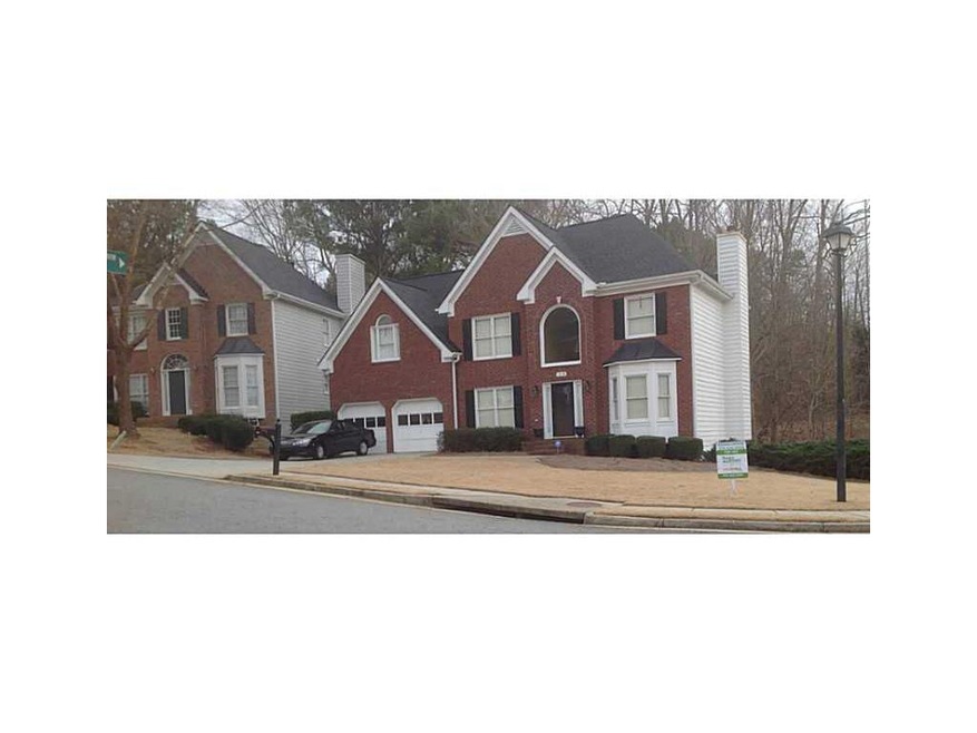 Exterior Front. Front on Corner lot, total 3 car g