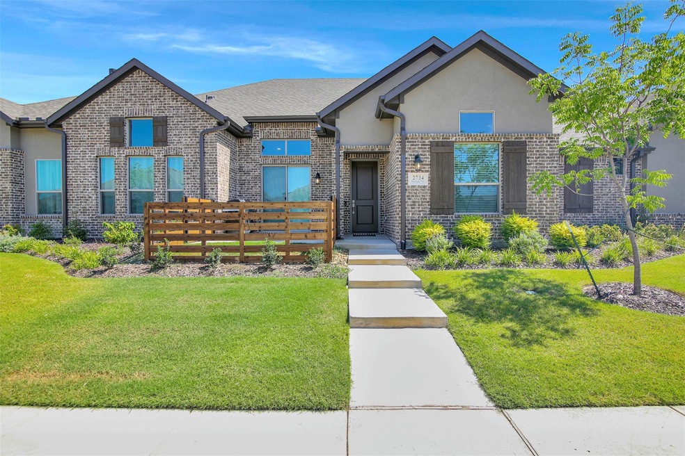 View of front of property with a front yard