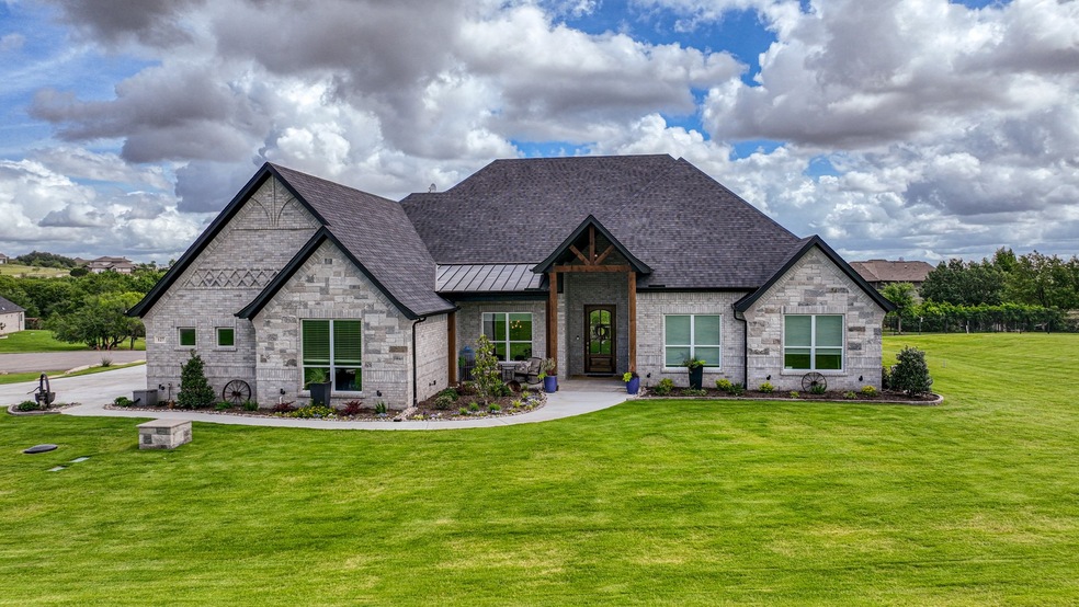 Front elevation from Club House Dr.