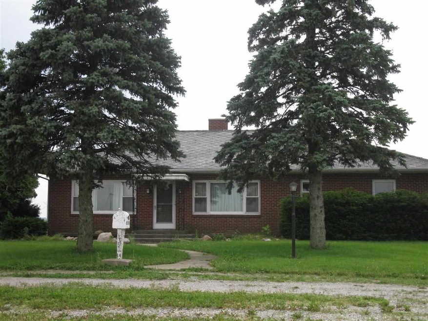 Brick ranch, detached garage, steel lean-to outbui