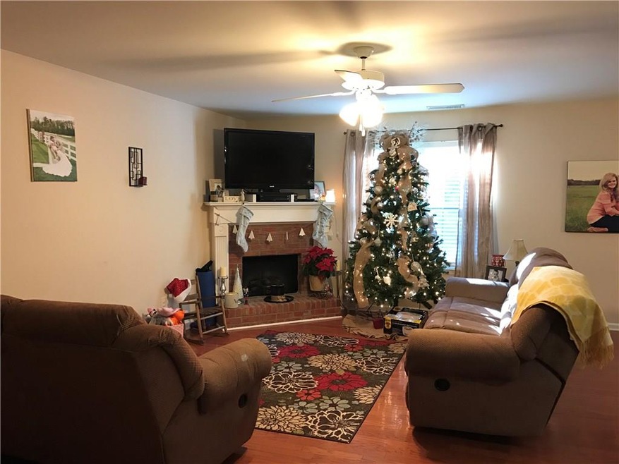 Great room open to kitchen and dining area. Hardwo