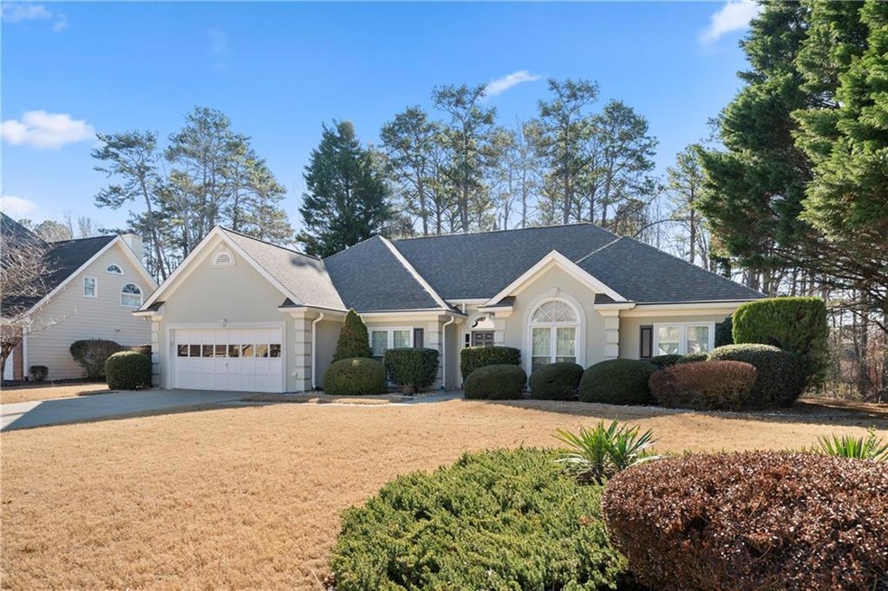 Single story home featuring a garage