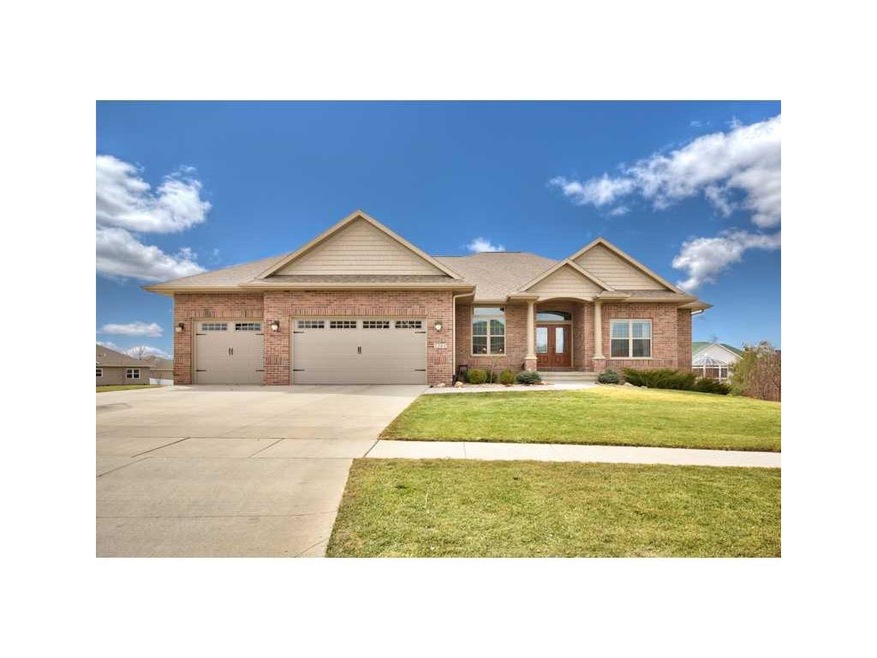 Front Exterior. GRAND ENTRANCE WITH BRICK FRONT