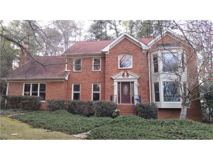 Four Sides Brick Home that backs up to the CCR Gol