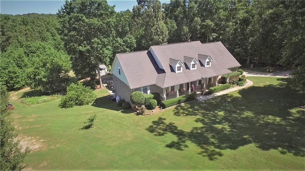Lots of room to roam on this 3.6 acre gated estate