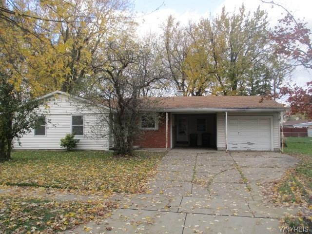 ATTACHED GARAGE PLUS CAR PORT