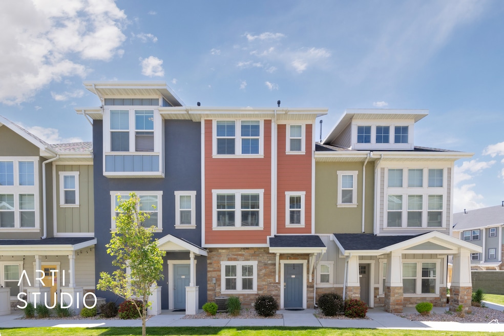 Multi unit property with board and batten siding and stone siding
