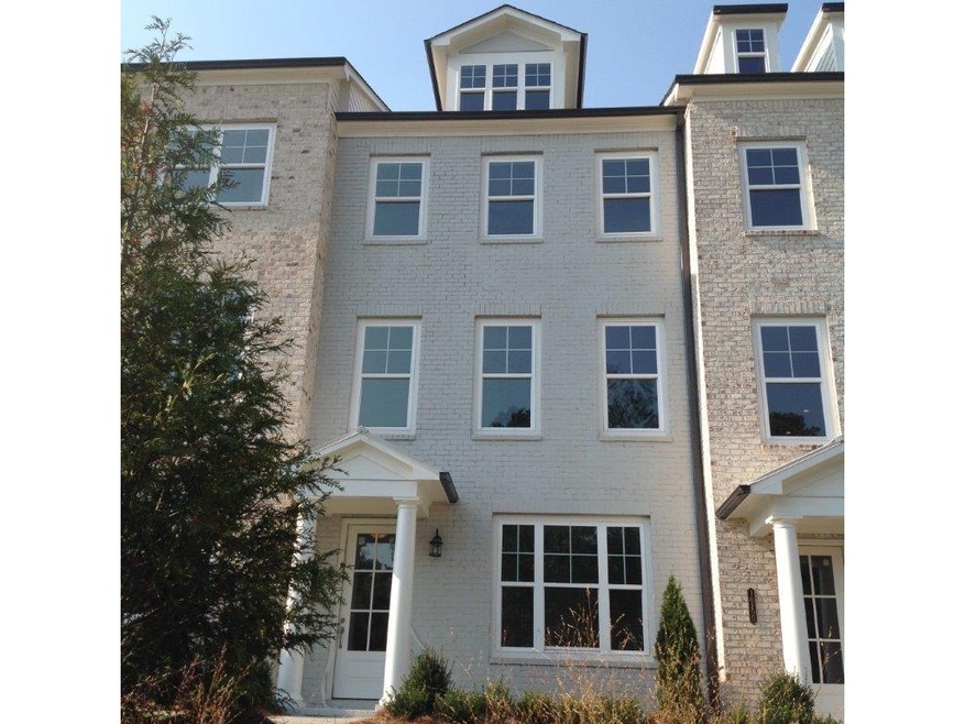 Homesite 224 is an interior brick unit with a cove