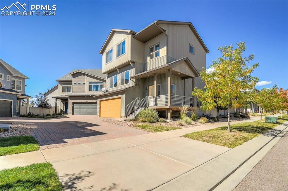 View of front of property with a garage