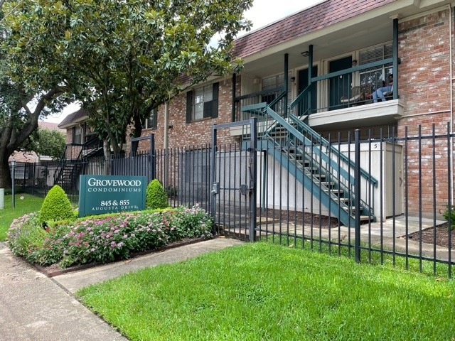 Charming condominium complex with brick exteriors