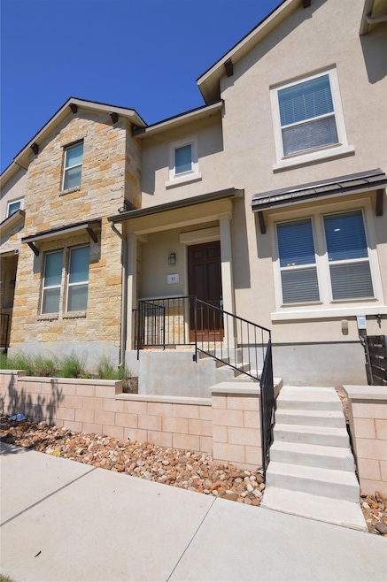 Multi unit property featuring stone siding and st