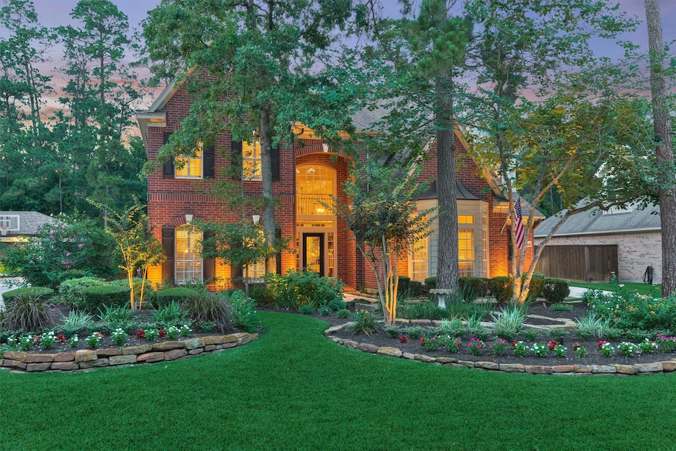 This beautiful two-story brick home is set amidst