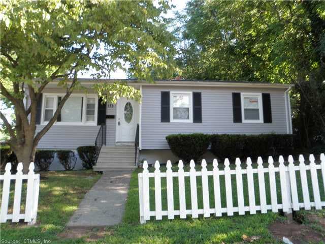Exterior Front. New windows, roof and siding
