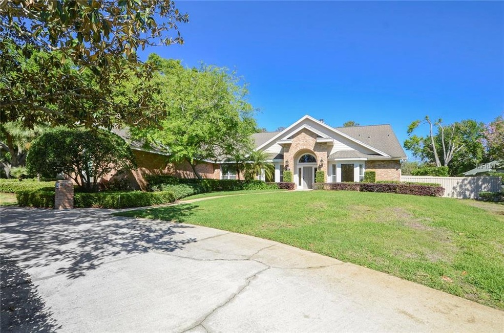 Lovely one story residence with circular driveway 