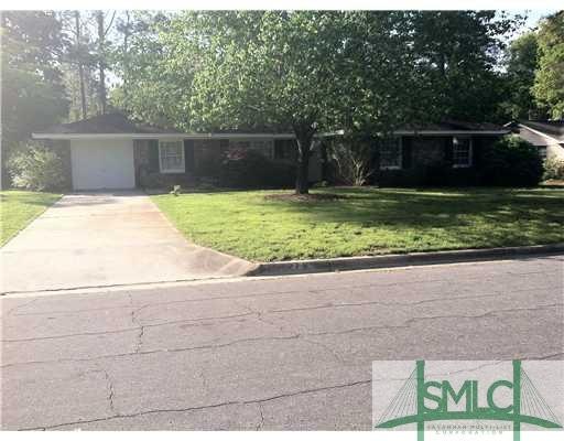 Exterior Front. All Brick 4 bedroom 2 bath home in