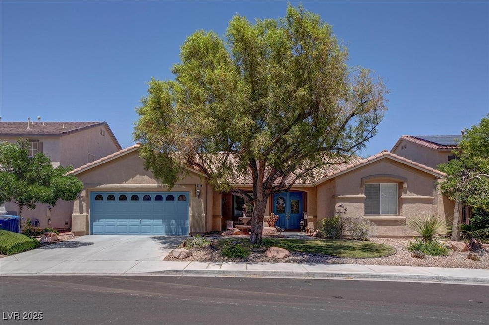 View of front facade featuring an attached garage,
