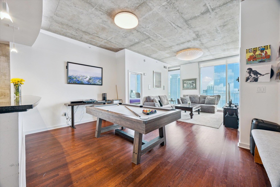 Recreation room with wood finished floors, billia