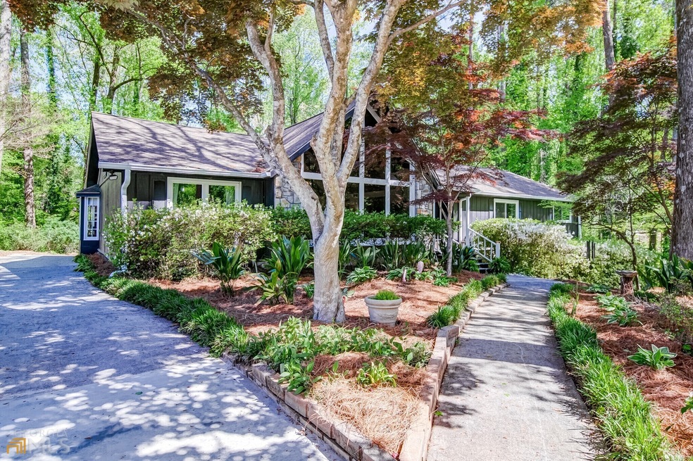 4587 Town Crier Rd SW, Lilburn, GA 30047 - photo 1