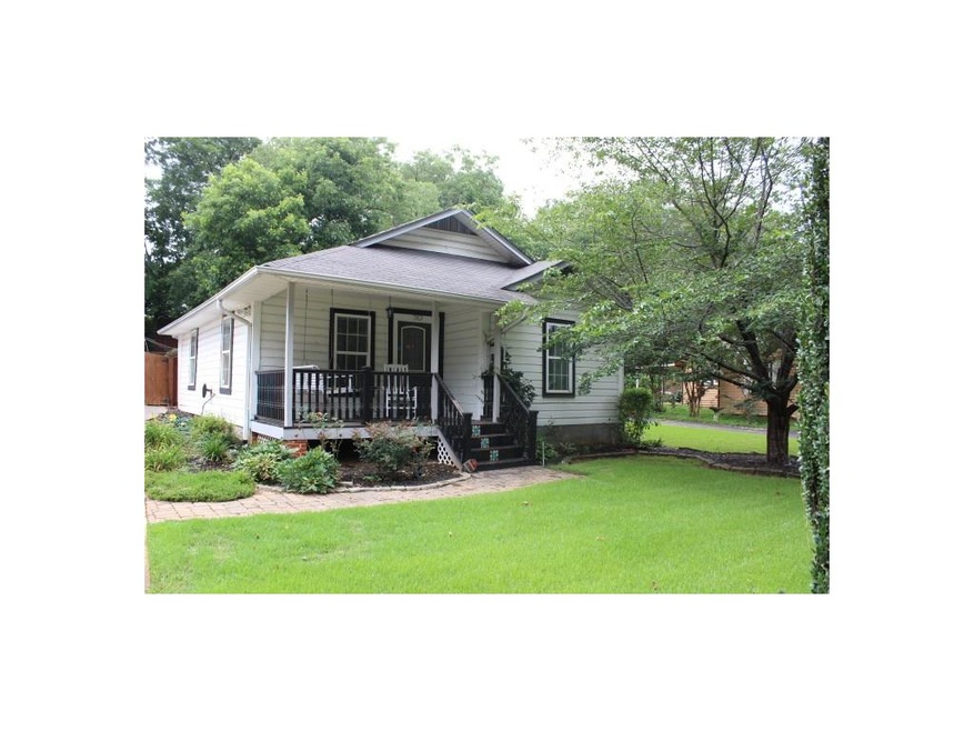Historic bungalow with front porch swing