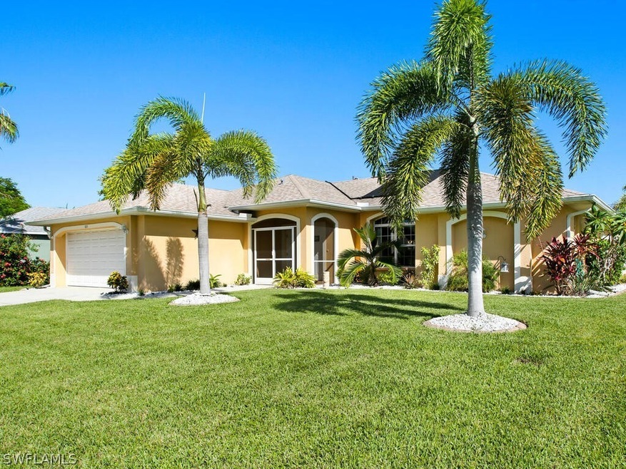 Front view. Screened Foyer and landscaped garden w