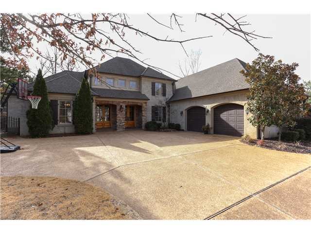 Beautiful slurried brick exterior with stone entra