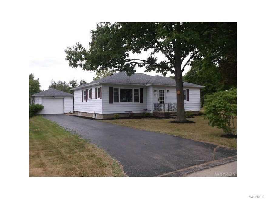 Exterior Front asphalt driveway and  detached gara